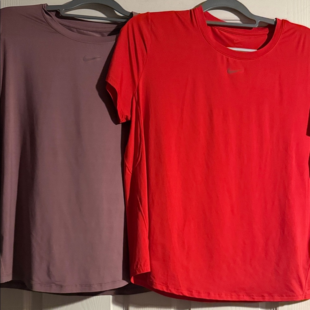 Nike Vibrant Red and Soft Purple Dri fit Tees